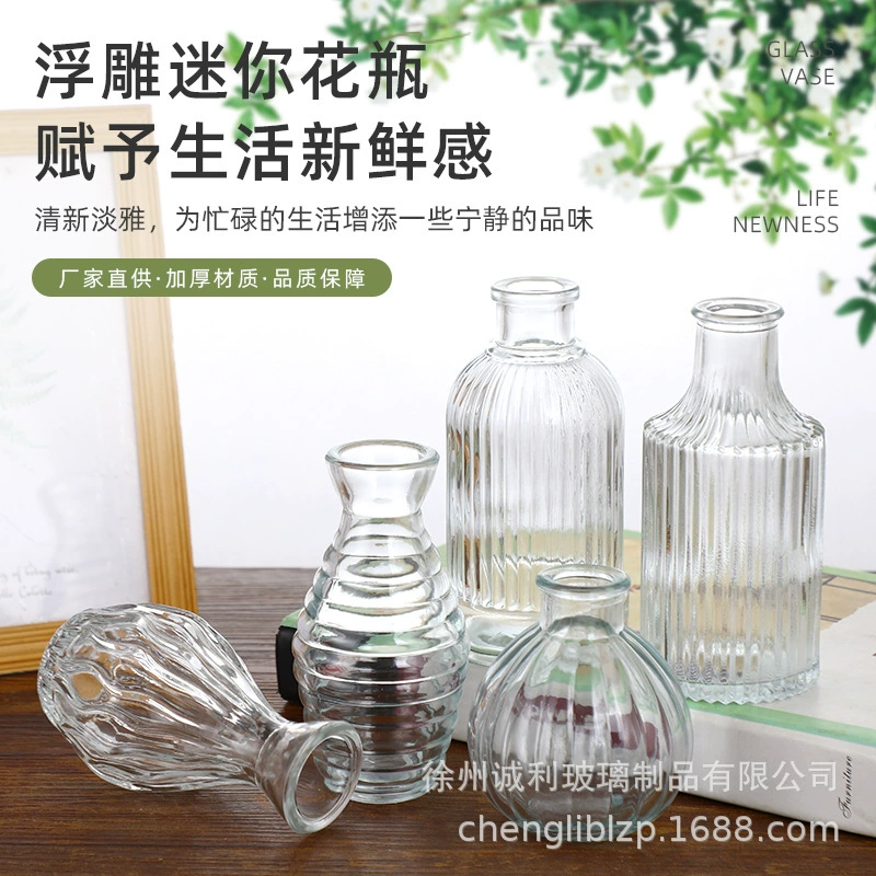 Ваза из тисненого стекла в стиле легкой роскоши для внешней торговли, прозрачное украшение для цветочных композиций в стиле инс, высококачественная винтажная мини-ваза.