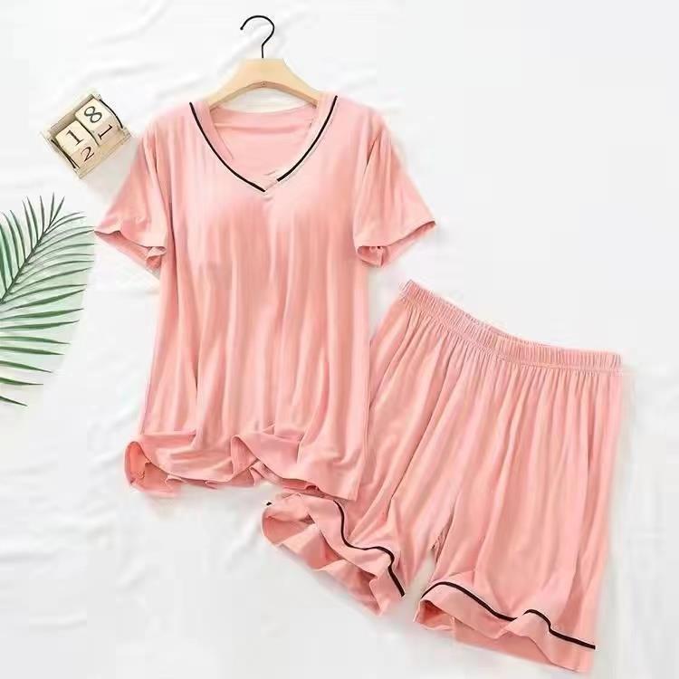 Pijamas de verano Pantalones cortos de manga corta para mujer con almohadilla en el pecho color sólido Delgado dulce suelto desgaste exterior simple traje de desgaste para el hogar