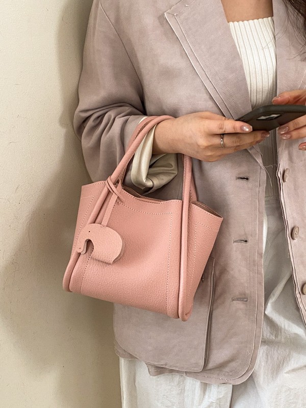 Bolso para mujeres 2026 nuevo estilo de moda bolso de cubo portátil de alta calidad lichi patrón popular lujo ligero mochila casual
