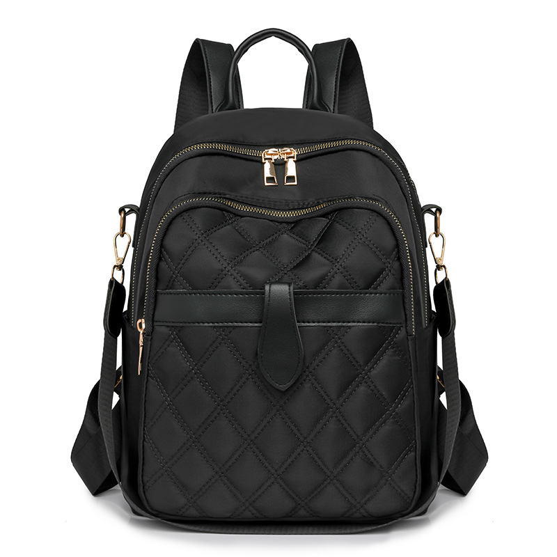 Mochila para mujer 2024 nueva mochila de viaje de ocio de nailon de la moda coreana de todo fósforo