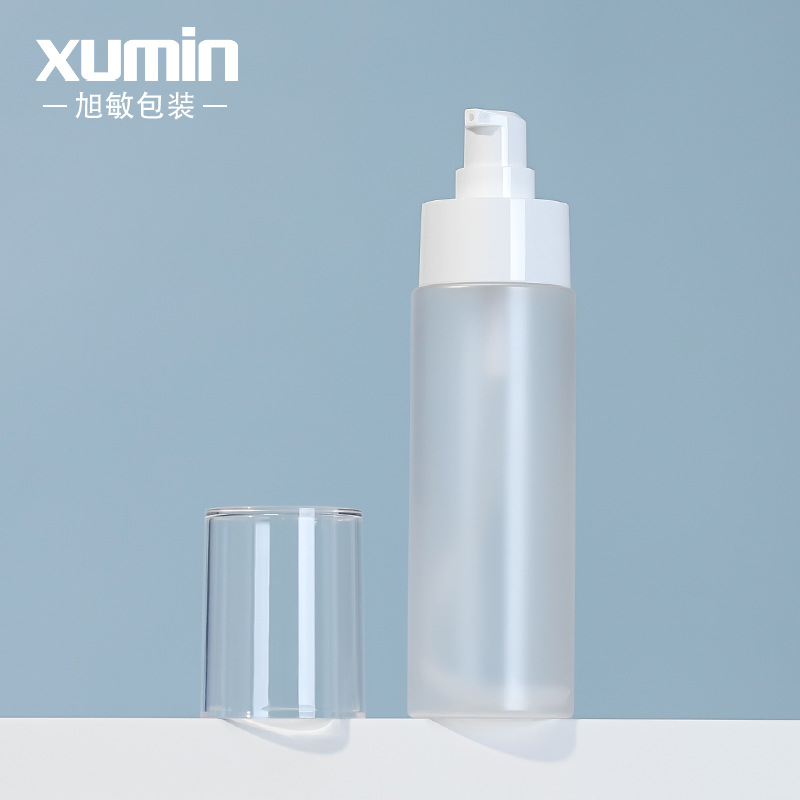 Embalaje de productos para el cuidado de la piel XUMIN botella de cabeza de bomba de presión simple viento 100ml botella de embalaje de emulsión de esencia PET