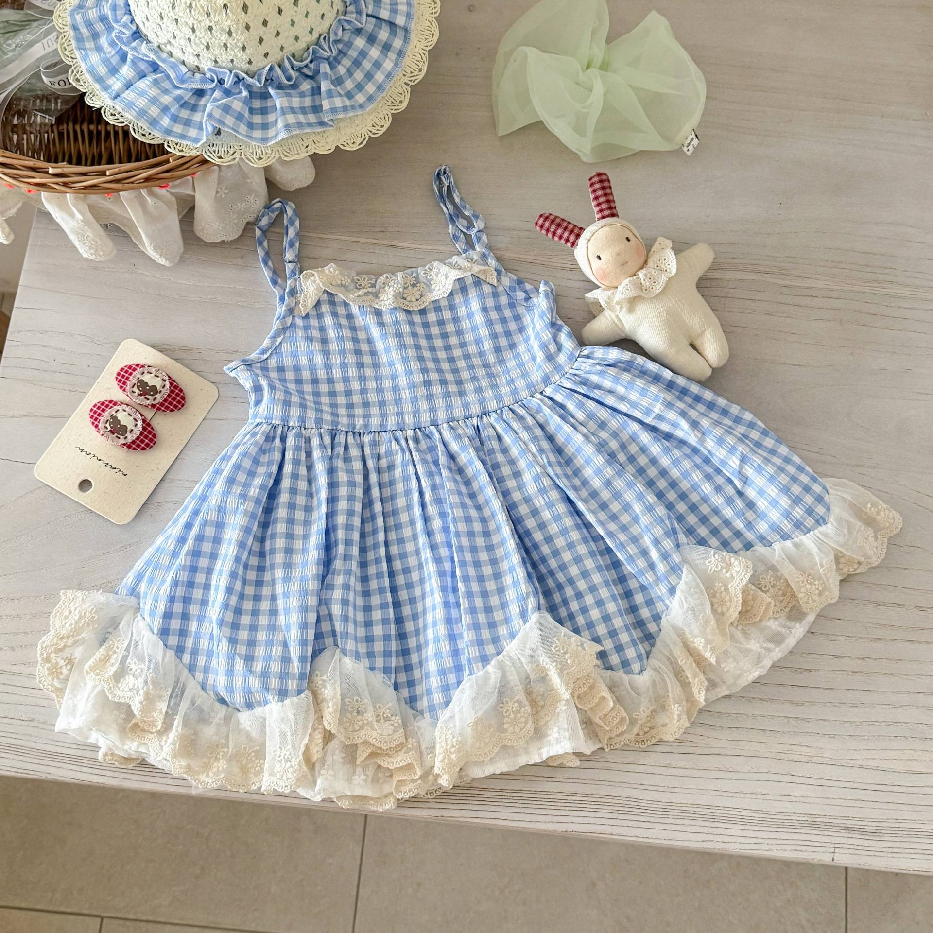[Xianning Seven] Vestido de niña de descanso de té 25 verano nuevo estilo para niños falda de tirantes a cuadros falda de encaje