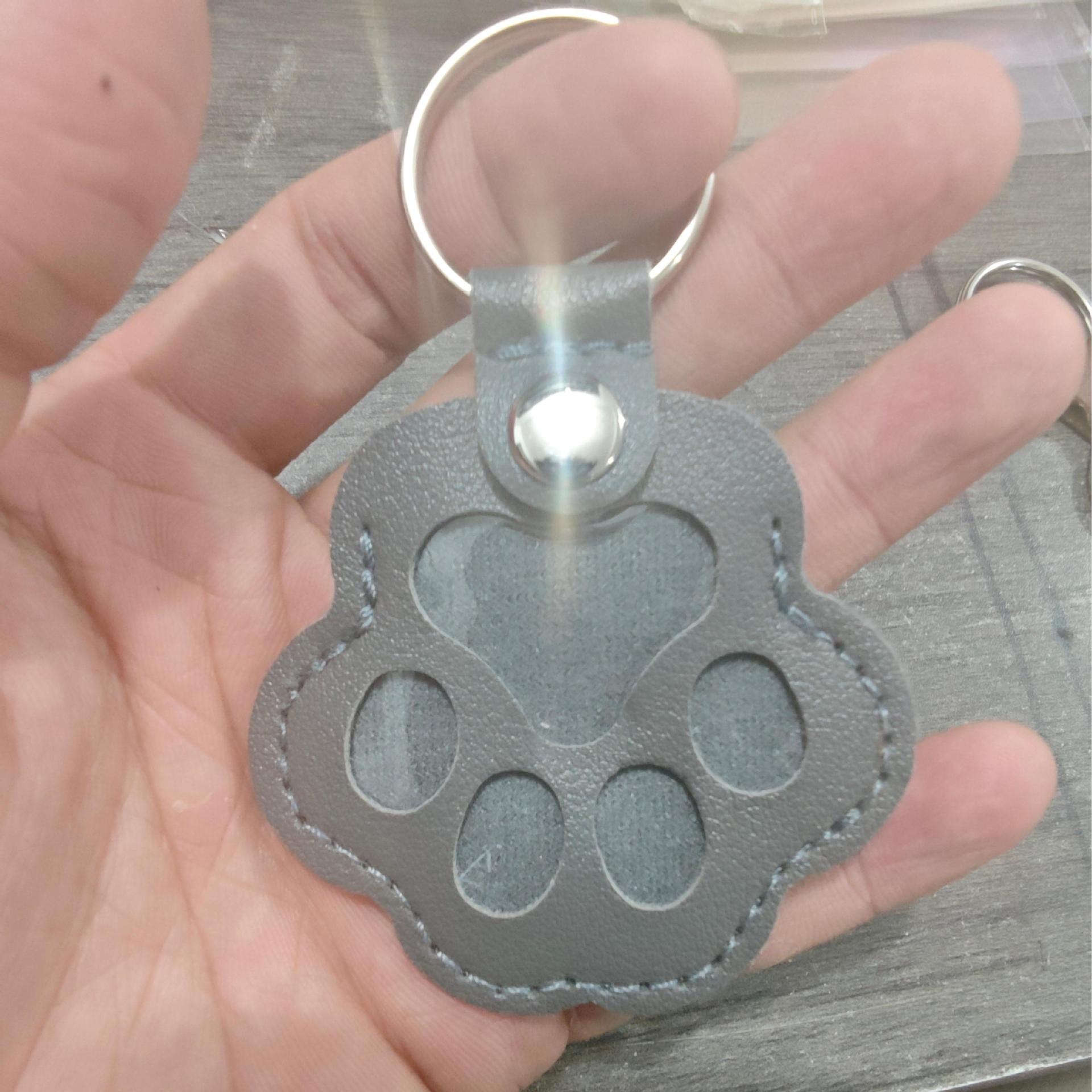 Gray keychain with opp bag