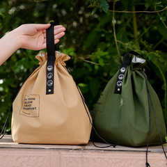 工場直売弁当バッグは大容量防汚学生サラリーマンランチバッグ保温弁当袋を持っています。