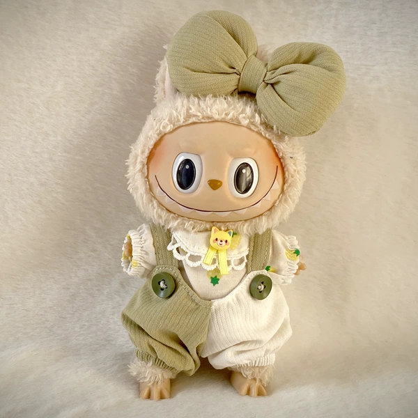 Green overall with bow