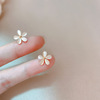 Fashionable earrings, Japanese and Korean, cat's eye, flowered, simple and elegant design, 2023 collection