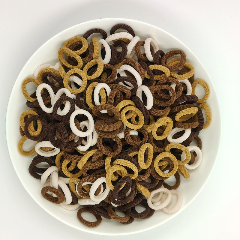 Color de caramelo de alta elasticidad pequeña toalla anillo de cabello bebé anillo de cabello no daña cabello atado fábrica de cabello al por mayor
