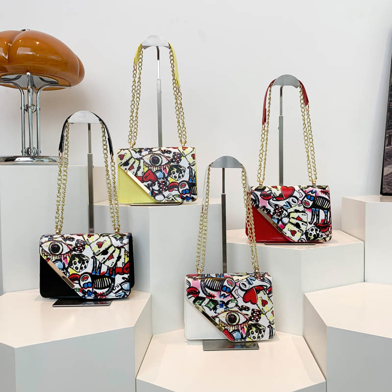 Moda personalidad graffiti impresión bolso de hombro 2024 nuevo nicho de diseño coreano cadena elegante bolso de hombro