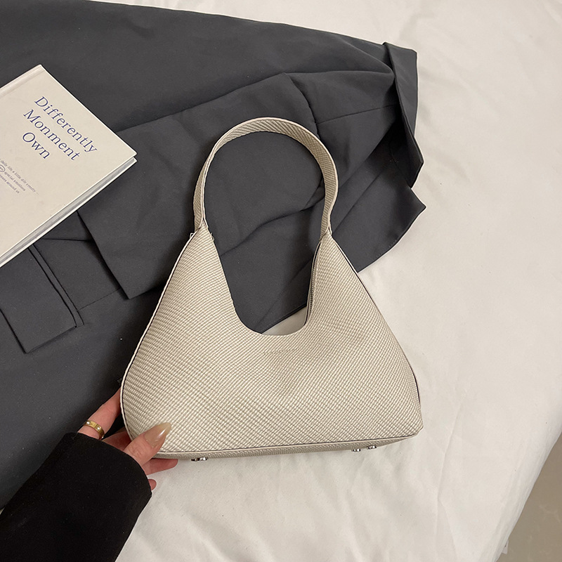 Bolso retro esmerilado para mujer de gran capacidad 2025 nuevo bolso de hombro de primavera y verano de todo fósforo bolso de axila de temperamento popular de este año