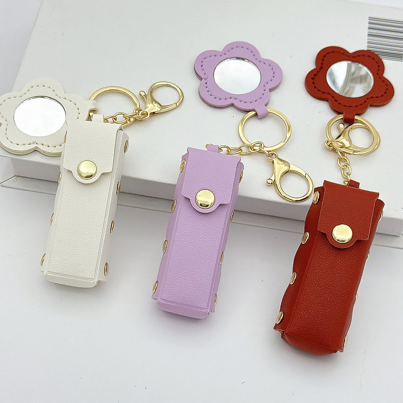 Flor pequeño espejo llavero creativo transfronterizo portátil mini cuero sobre rojo spot llavero bolso colgante