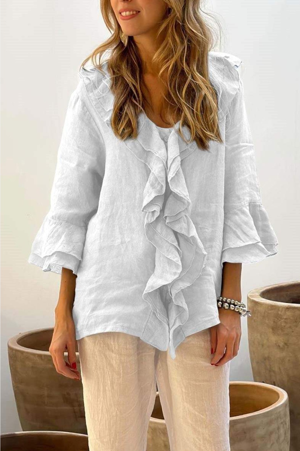2024 estilo europeo y americano transfronterizo otoño color sólido nueva moda con cuello en V mangas voladoras con volantes suelta casual top mujer