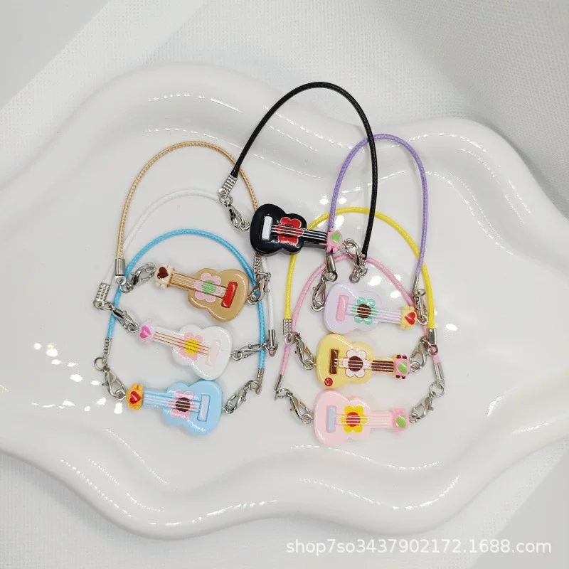Small doll house, guitar, keychain
