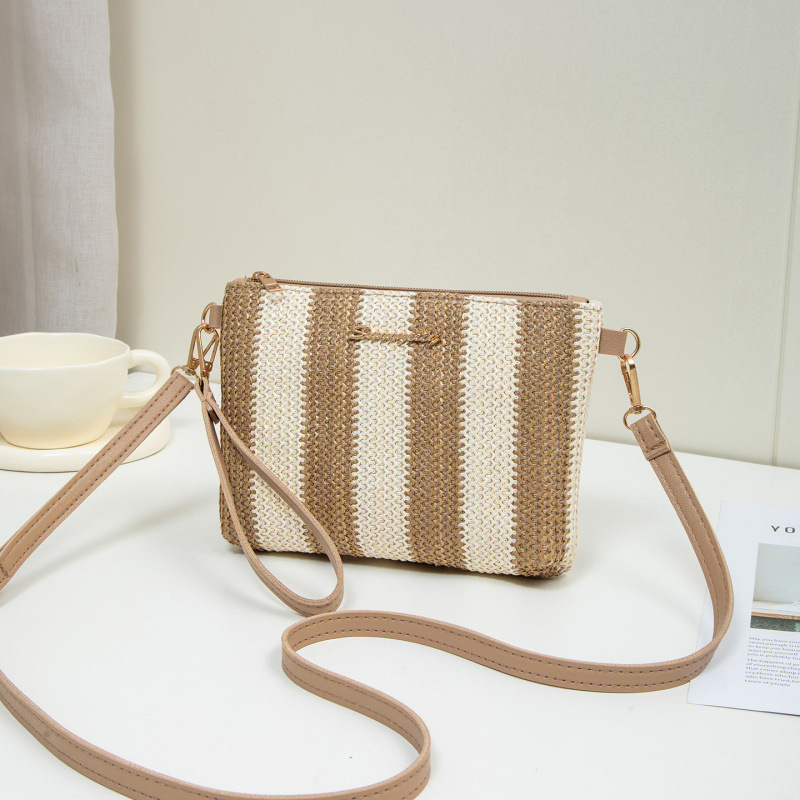 Bolso de verano para mujeres 2025, nuevo estilo de tela tejida bolso de paja de moda bolso de hombro con cámara bolso de mochila un cabello