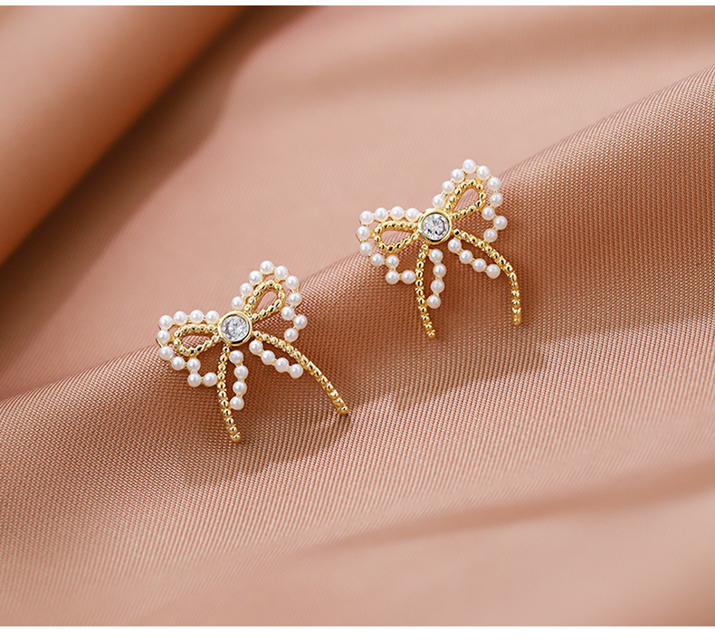 Korean Style Pearl Bow Earrings Wholesale display picture 7