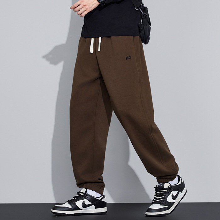 2025 nuevo estilo primavera y otoño suelto pie rectas bordado pantalones masculinos japoneses retro suelto pantalones de tendencia versátil