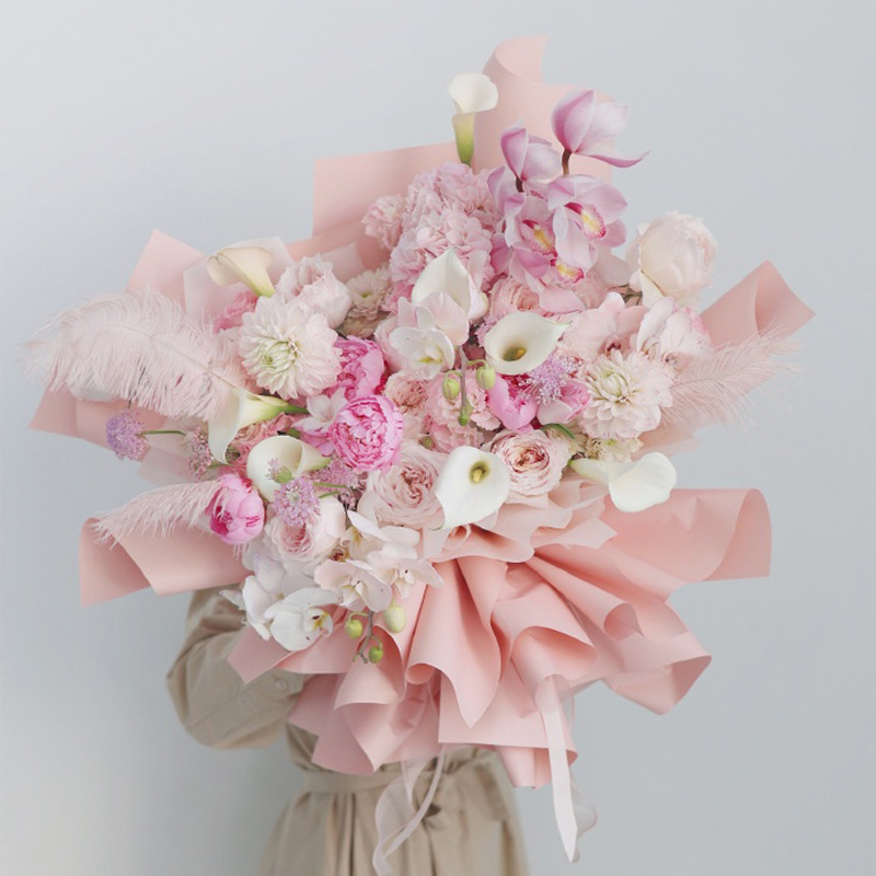 Deca papel de embalaje de flores de color sólido en stock al por mayor papel ouya impermeable material de la tienda de flores papel de embalaje material de bricolaje