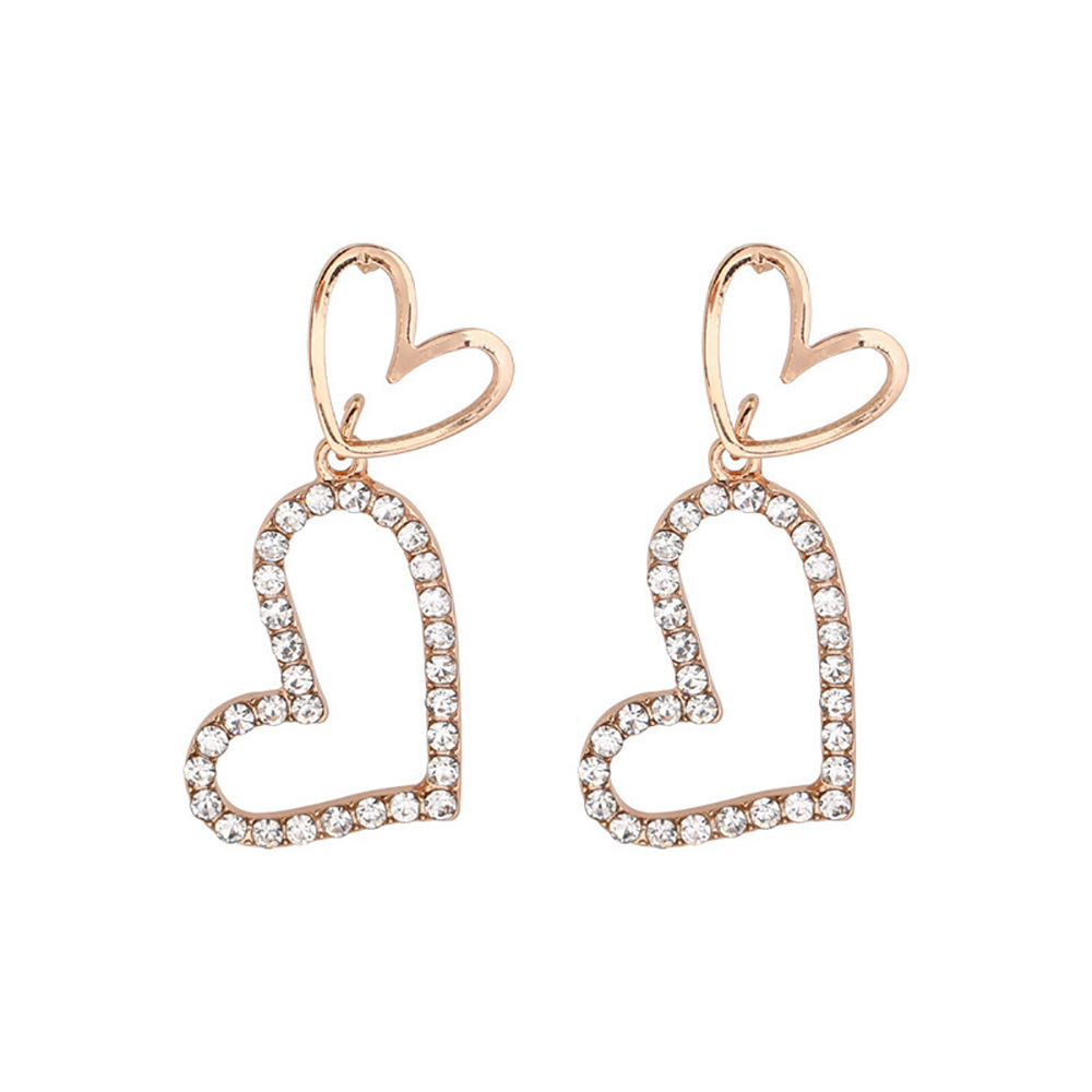 Pendientes de doble amor con aguja de plata y diamantes Pendientes coreanos de diseño hueco dulce y simple Pendientes de temperamento de moda de todo fósforo