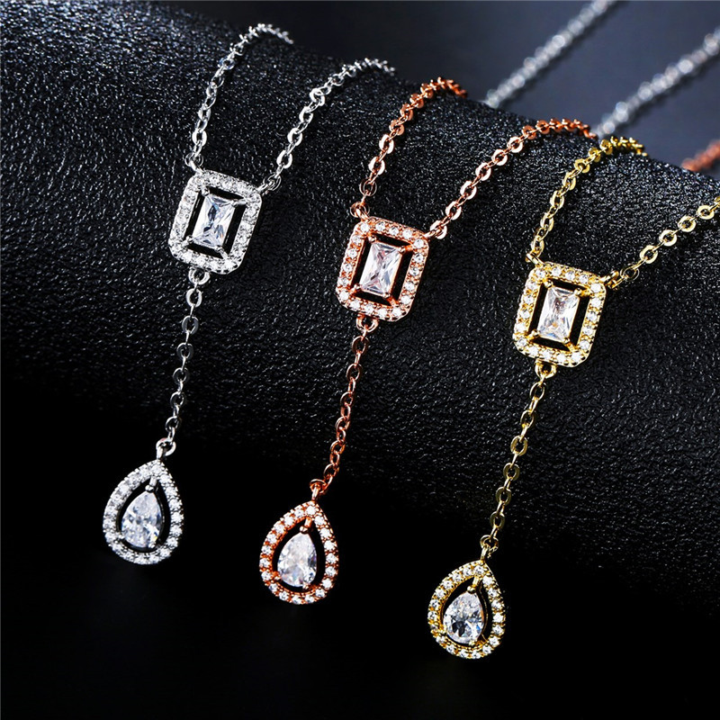 Parure collier et bracelet éléments goutte d'eau en zircon_voghion.com