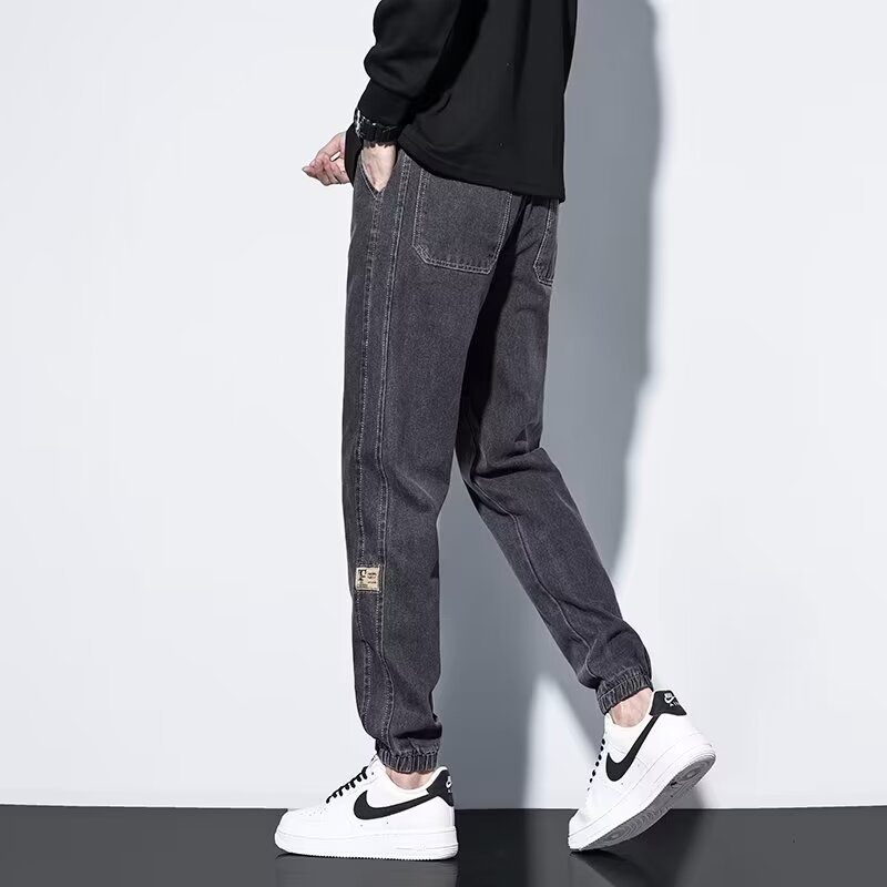 2024 primavera y otoño pantalones vaqueros de cintura elástica todo fósforo para hombres, pantalones de pierna ancha rectos sueltos para adolescentes de la calle principal