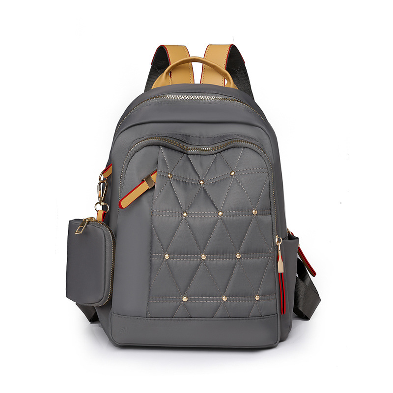 2024 nueva mochila de color de contraste para mujer de moda Lingge ocio de gran capacidad al aire libre mochila de viaje ligera al por mayor