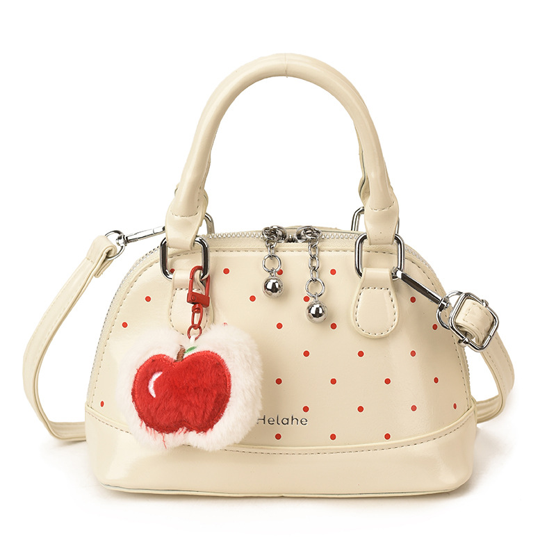 Bolsas coreanas para niños y niñas, bolsas de conchas, bolsas de mano de manzana, bolsas para niños, bolsas de comercio exterior transfronterizas 2026
