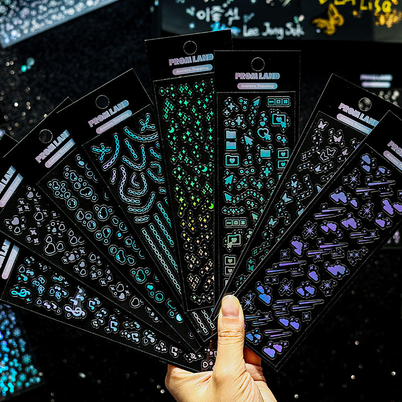 Pegatinas de diario de láser estrellado transparente impermeable pegatinas de niños lindos pegatinas de tarjeta Goo traje al por mayor