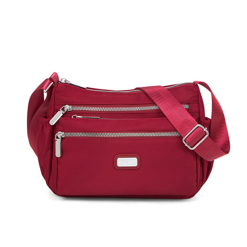 Bolso bandolera de tela Oxford para mujer 20247 nuevo bolso de mujer de mediana edad, bolso de madre de nylon de viaje de gran capacidad, todo fósforo