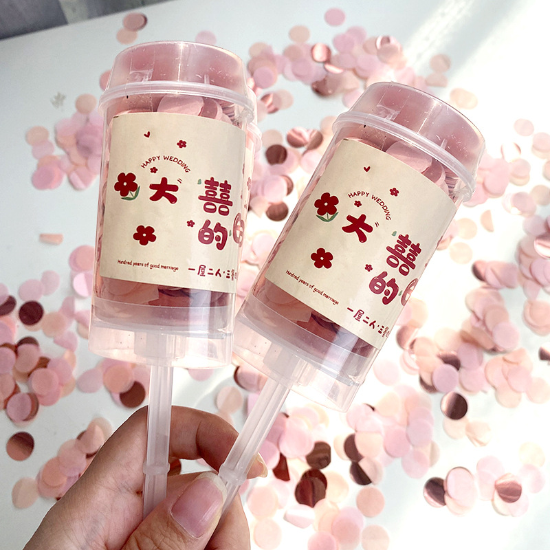 Boda tubo de pulverización boda pequeño regalo pistola mano empuje giro pistola cumpleaños pequeño regalo bomba empuje música