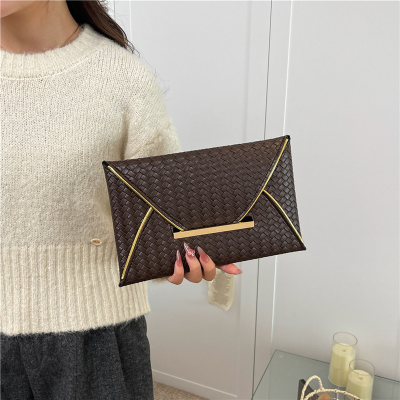 Simple color sólido popular de alto rendimiento sobre de sensación de mujer cena temperamento ligero lujoso moda bolsa de mano casual
