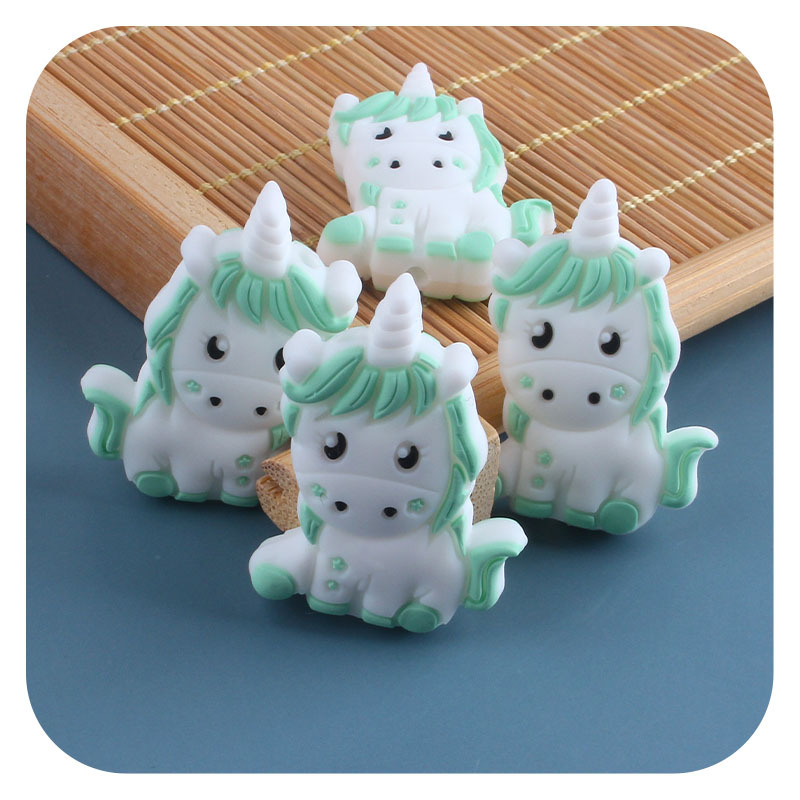 Nuevo bebé suministros unicornio de dibujos animados cuentas silicona creativo DIY chupete cadena pulsera juguete mordedor Accesorios