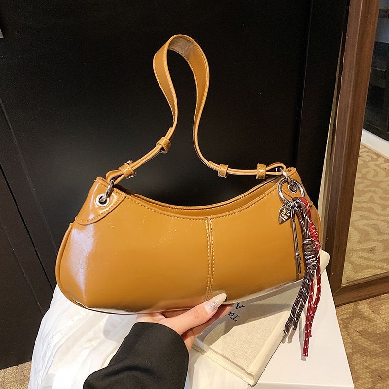 Bolso de axila retro estilo Hong Kong 2025 verano nuevo bolso femenino bolso de textura de alta gama transmisión en vivo del mismo bolso de hombro marea