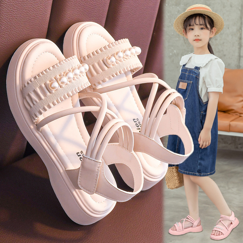 Sandalias para niñas 2025 verano nuevo estilo zapatos de princesa para niños zapatos de playa de suela suave antideslizante de suela suave zapatos para niñas de mediana edad