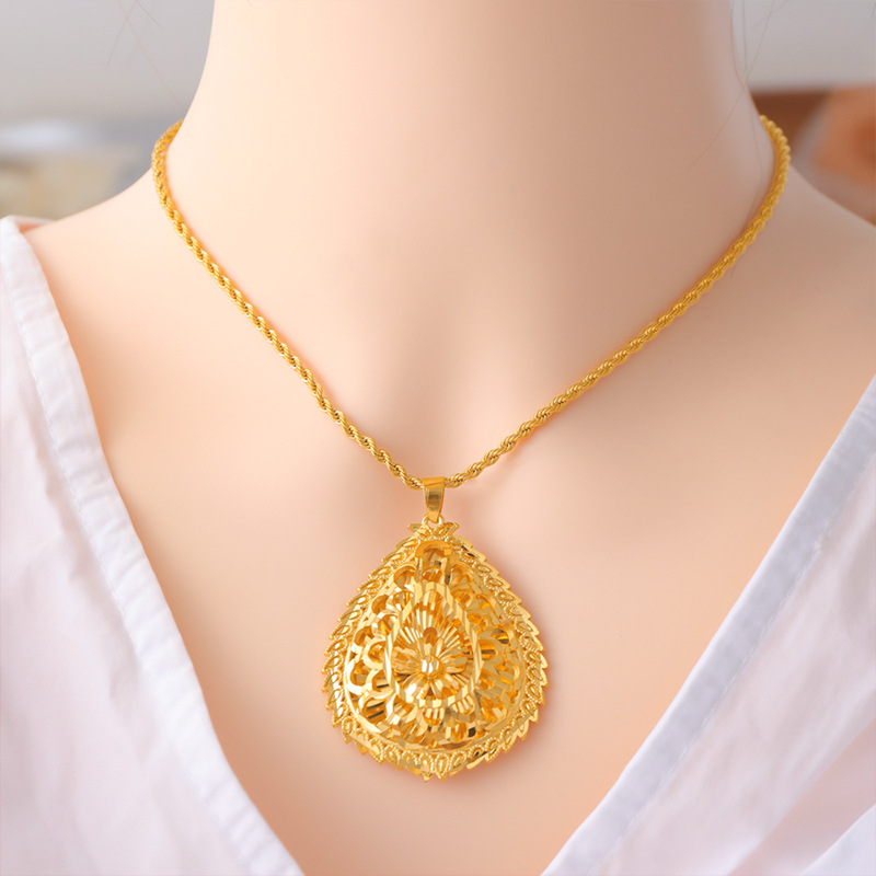 Sand Gold hombres y mujeres gota de agua colgante flores como brocado joyería hueca estilo nacional todo fósforo accesorios de temperamento suministro directo de fábrica