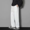 White trousers, loose straight fit