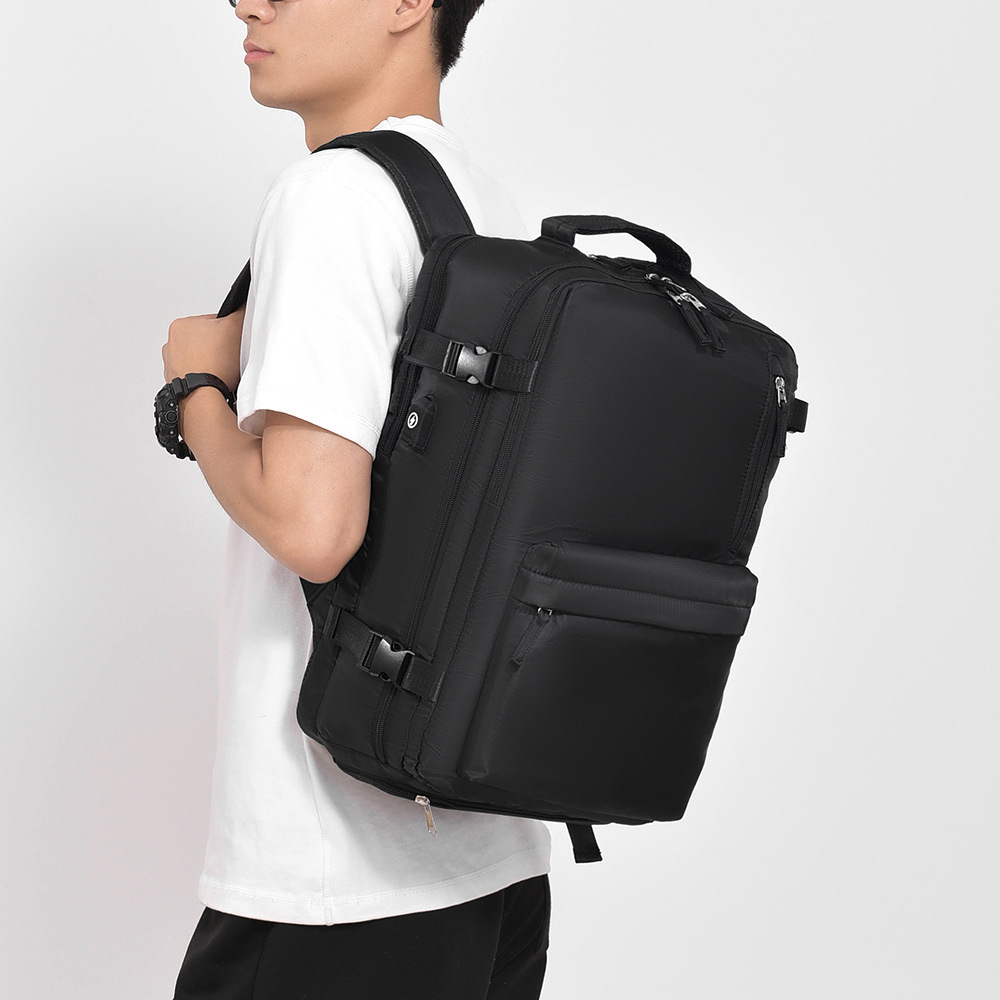 Mochila de viaje transfronteriza 2025 mochila de ocio multiusos de gran capacidad con interfaz USB bolso de viaje de negocios