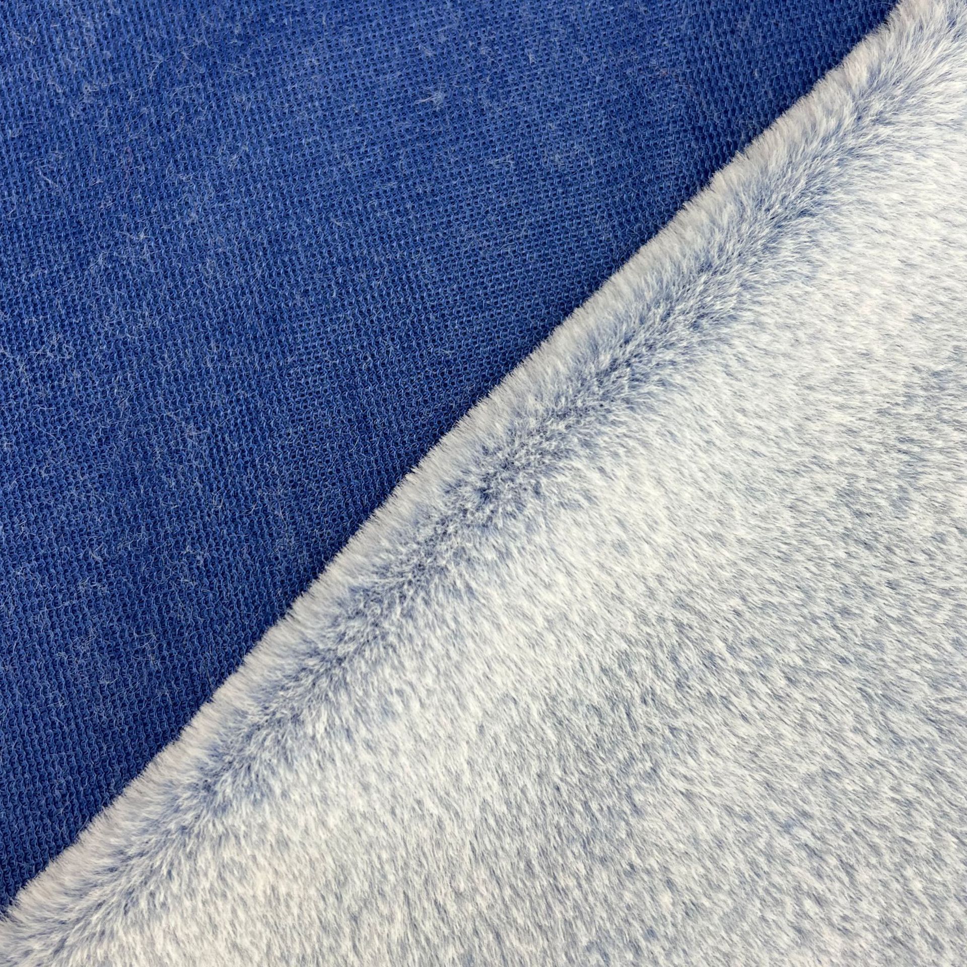 Tela de piel de conejo de dos colores con fondo de impresión trasera en stock