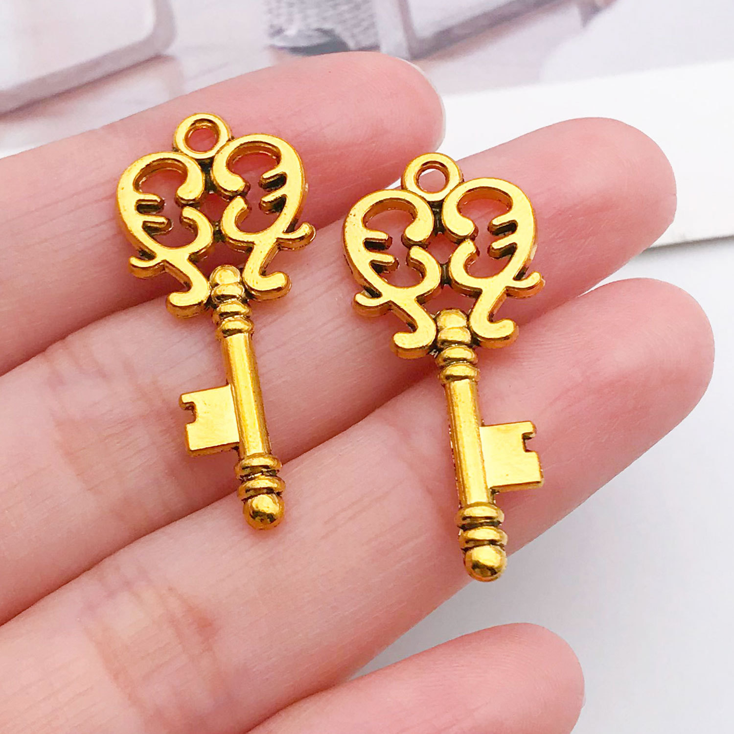 10230-M-古金锌合金钥匙19x33-1.9g