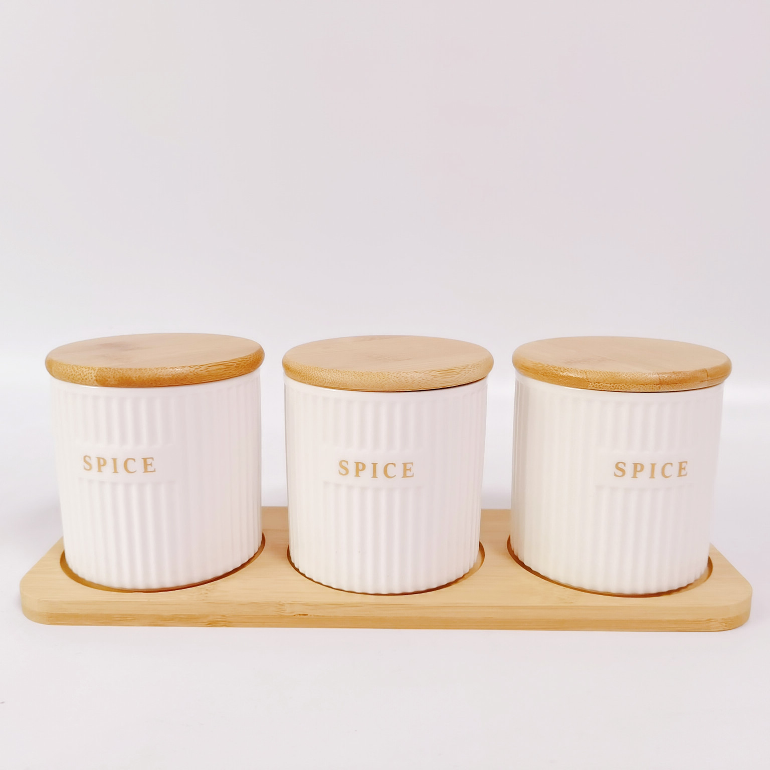 Fábrica directa de cerámica a rayas condimento tarro de almacenamiento tarro traje cocina almacenamiento tarro sal tarro hogar condimento tarro