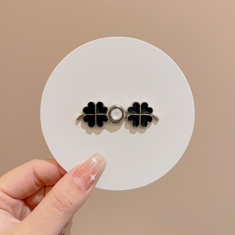 La cintura de los jeans se cambia a un botón de cintura pequeño, broche, falda de mujer, ajuste de cintura, dispositivo de ajuste, alfiler, botón anti-luz fijo