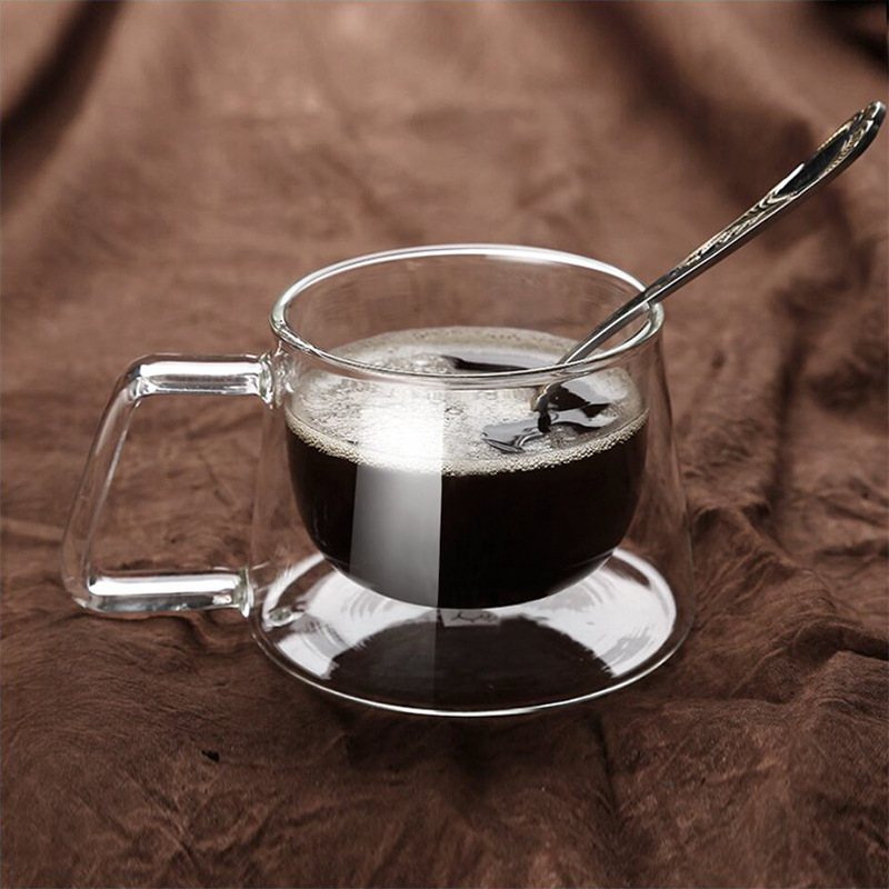 Copo térmico de dupla camada, transparente, resistente ao calor, com alça, para café, chá ou água, ideal para escritório. Fabricado em borosilicato de alta qualidade._voghion.com