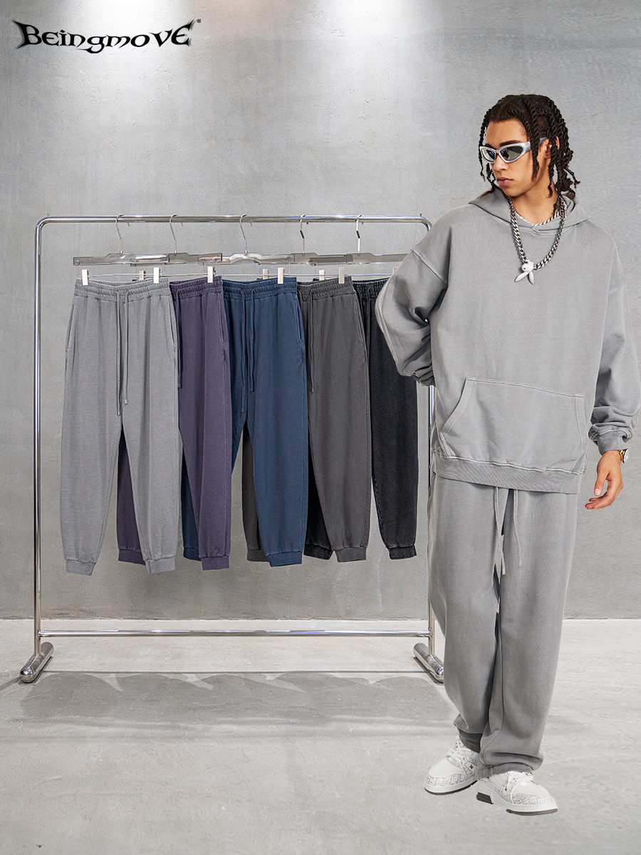 2025 otoño moda callejera pantalones casuales de color sólido sueltos pantalones pequeños pies cerrados pantalones de baño hombre al por mayor