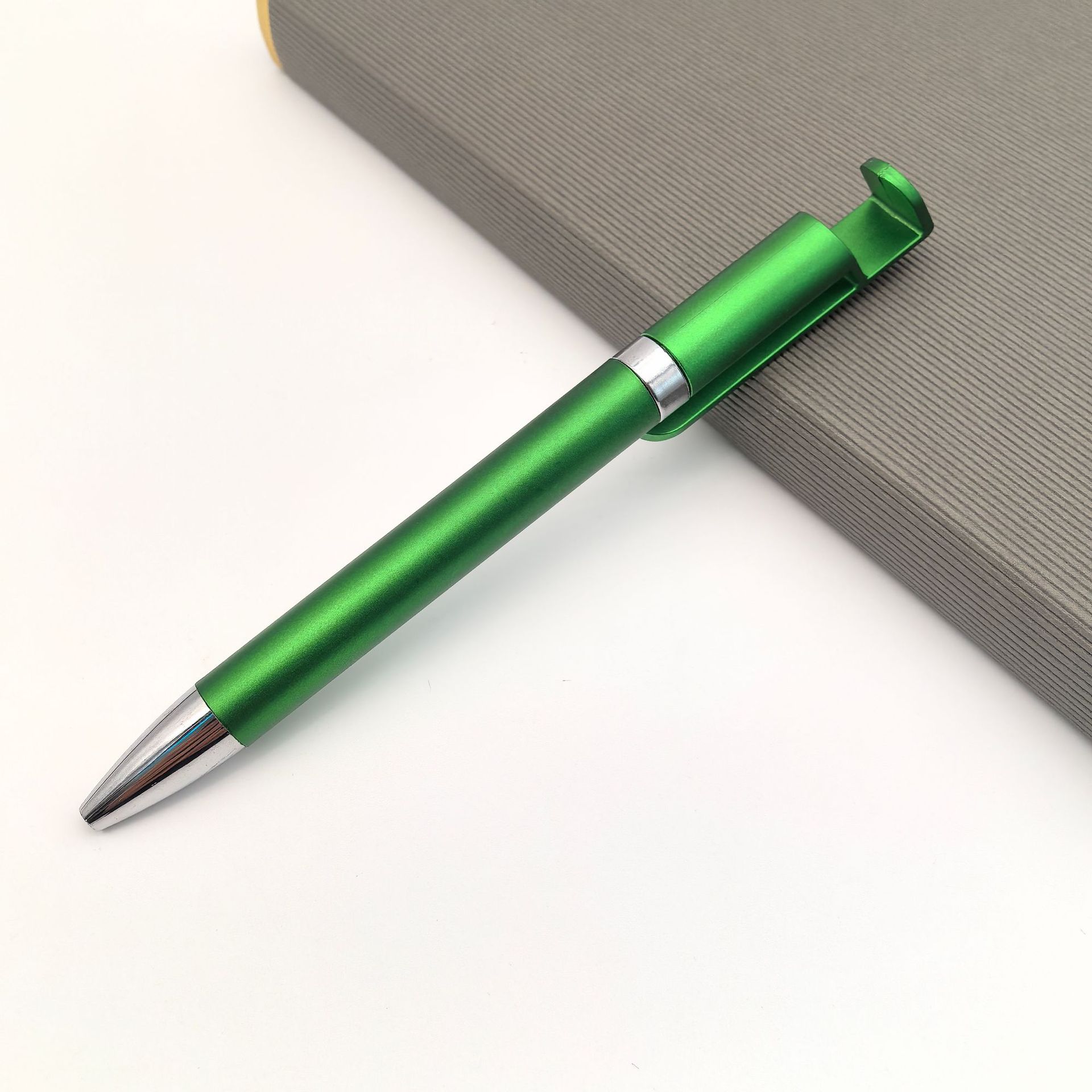 Bolígrafo de soporte para teléfono móvil multifunción Bolígrafo de regalo al por mayor Bolígrafo de plástico retorcido personalizado Bolígrafo publicitario de soporte para teléfono móvil