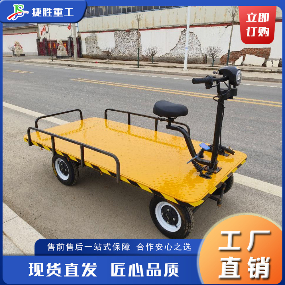 pequeño camión eléctrico de tracción de ladrillos de carretera estrecha tipo vehículo de herramienta de asiento de construcción ferroviaria camión de carga y descarga de placa plana