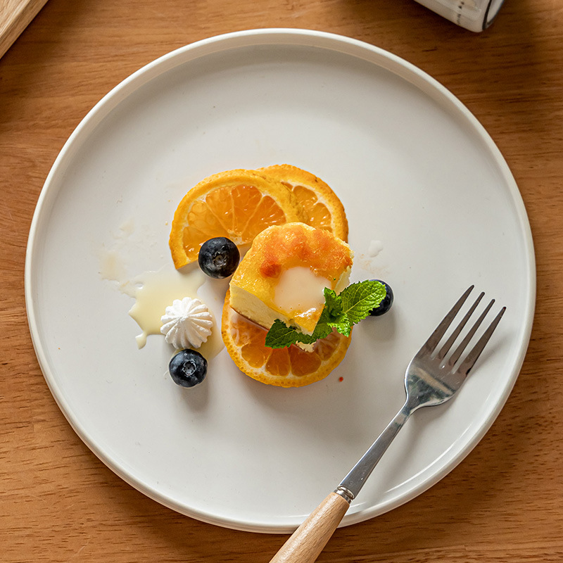 Plato plano de cerámica de estilo nórdico Plato redondo exquisito para el hogar Plato de carne occidental Plato de pasta Plato de vajilla Plato al por mayor