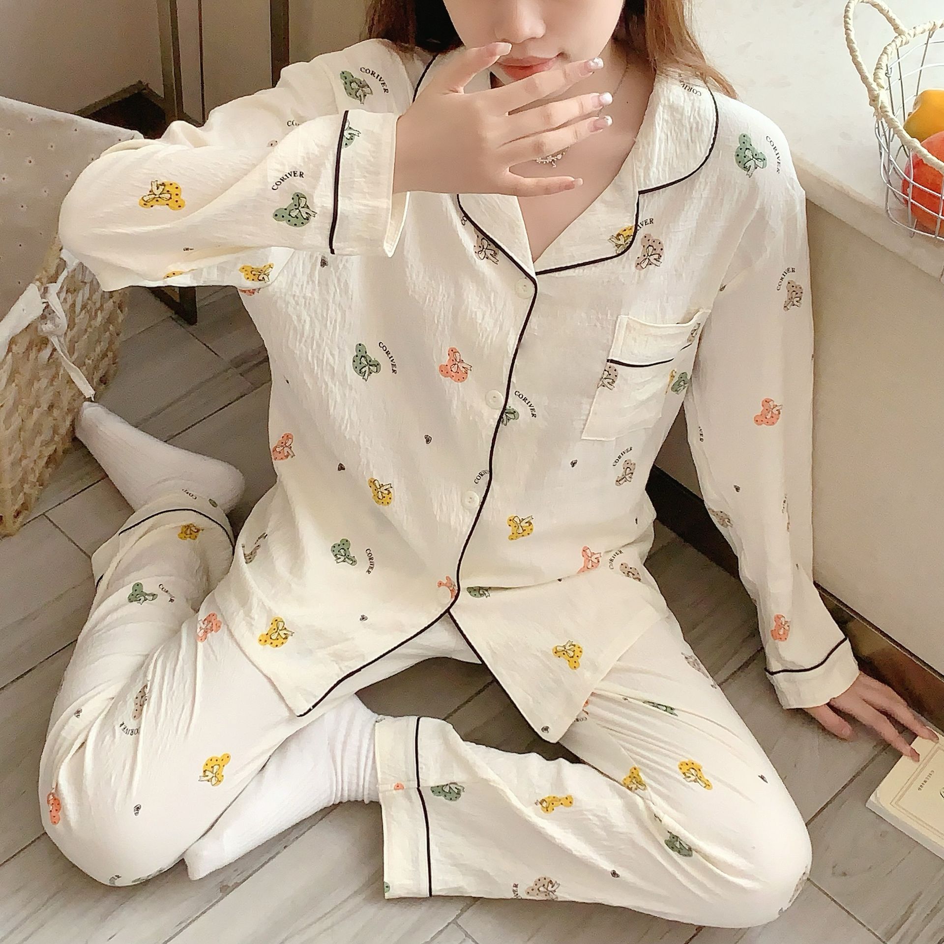 Al por mayor transfronterizo KT gato pijama mujer primavera y otoño nubes algodón manga larga 2026 nuevo juego de ropa de hogar encantadora super caliente