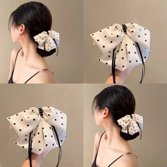 高級感のある蝶結びのリボンは女性の波の点の馬尾のクリップのヘアピンの優しさの気質の半髪でサメのクリップを挟みます。