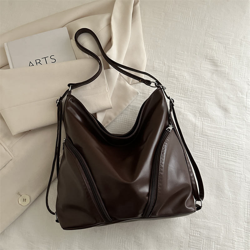 Bolso de mujer de cuero blando 2024 nueva mochila de gran capacidad de transporte de moda mochila simple ocio de moda tote