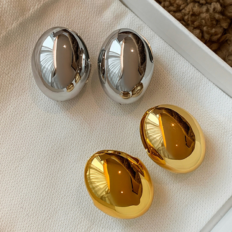 European and American niche design smooth gold eggshell oval ball earrings women's high-end exaggerated unique metal earrings earrings European and American niche design smooth gold eggshell oval ball earrings women's high-end exaggerated unique metal earrings earrings