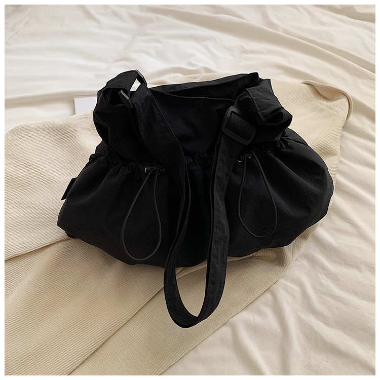 Bolsa de lona de gran capacidad para mujeres 2024 nuevo bolso de hombro casual simple de verano con un sentido de alta calidad de la bolsa de viaje