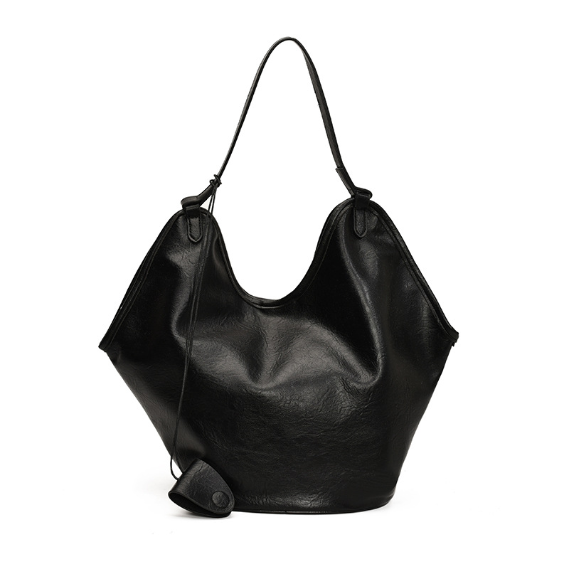 Bolsa de cubo transfronteriza de gran capacidad, bolsa de viaje retro de mujer 2025, otoño y invierno, nueva moda, bolsa de brazo, bolsa de hombro universal